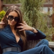 Patrycja Tuchlińska w niebieskim kombinezonie